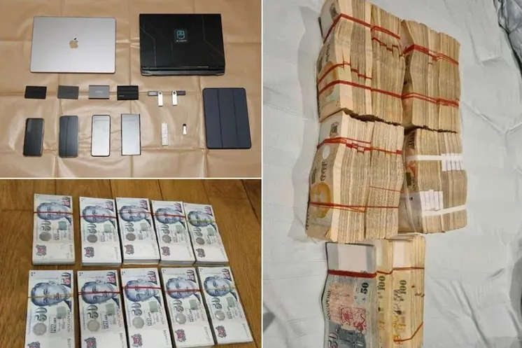 Электронные устройства и наличные деньги хакеров / фото полиции Сингапура 